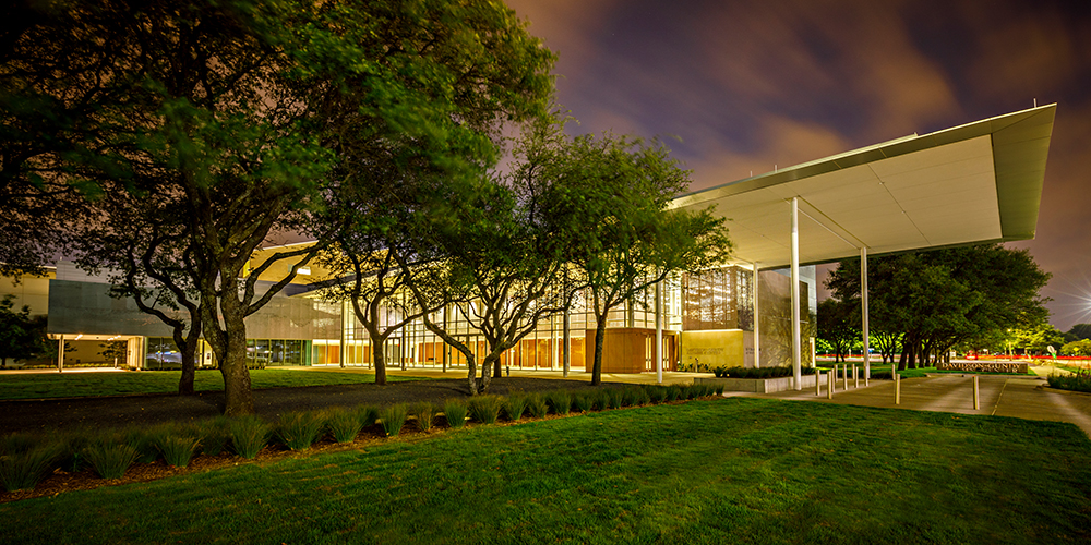 Nighttime photo of the alumni center