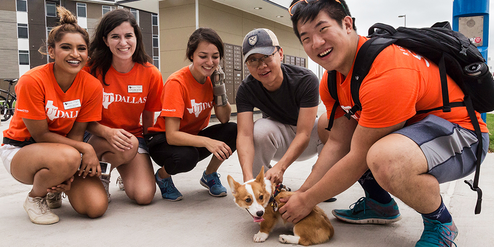 Helping students move in can be a long process. Luckily, graduate student Yifan Li was puppy sitting Momo, a four-month-old corgi, giving staffers a welcome break.