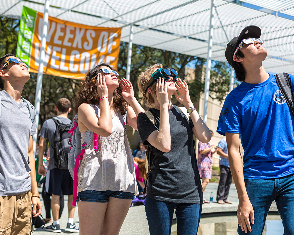 Martin David, Bianca Munoz, Victoria Koshevarova and Patrick Nguyen viewed the eclipse from Trellis Plaza.