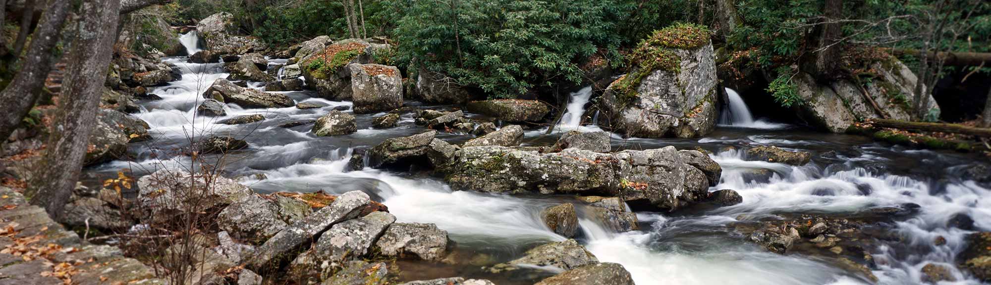 Water rushes through Little Stony Creek in a timelapse panorama photo by President Benson
