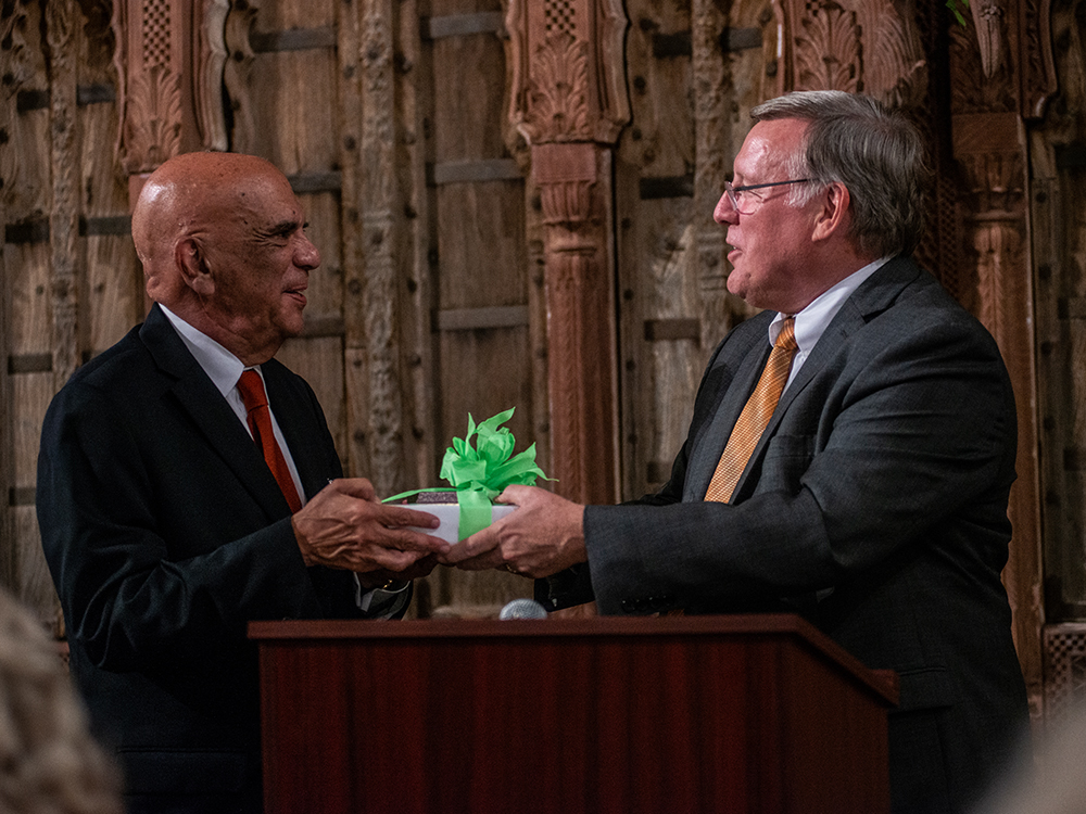 Jorge Alberto Lozoya accepts a gift from Dr. Richard C. Benson