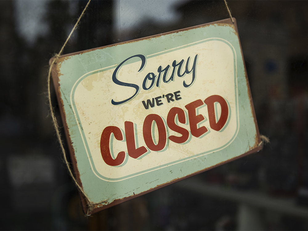 Sign that reads "Sorry, we're closed."