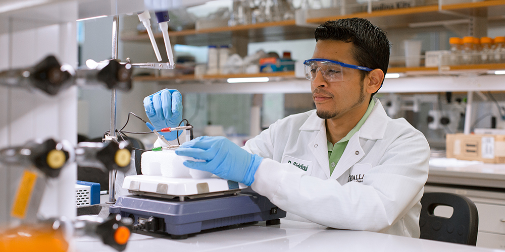 Danyal Siddiqui conducts research in a lab