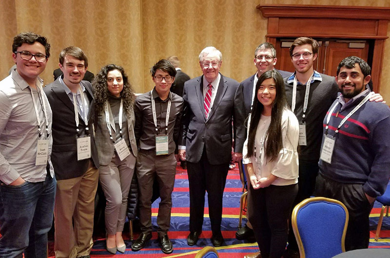 CAFE students with Steve Forbes at a conference