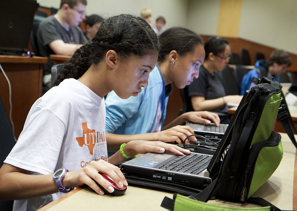 Teenagers coding at a UT Dallas camp