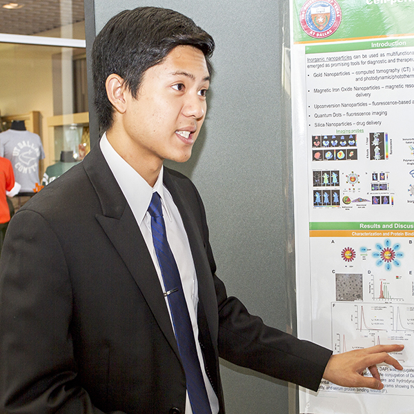 Anthony Dao, a junior biology major, describes his research on gold nanoparticles for biomedical applications. His project won second place in the 2016 poster competition.