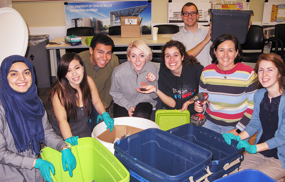 Eco-Reps learn about worm composting bins so they can spread the word at UT Dallas. From left: Aasya Peera, Samantha Manuel, Fred Traylor, Delaney Conroy, Emily Stinnett, sustainability coordinator Evan Paret (standing), associate director of energy conservation and sustainability Thea Junt, and Kelsey Lyle. 
