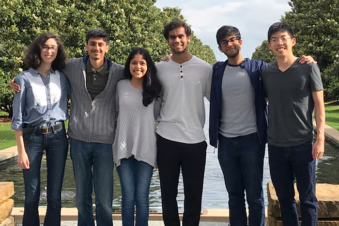 Nesarikar and teammates posed together outdoors on campus
