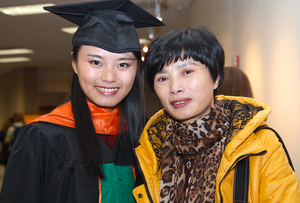 Lu Chen with mother at UT Dallas' Graduation Reception