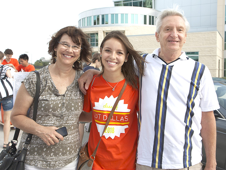 Michaela Gulasy (center), an ATEC major, stops for a photo with her mom, Terri, and dad, Dennis.