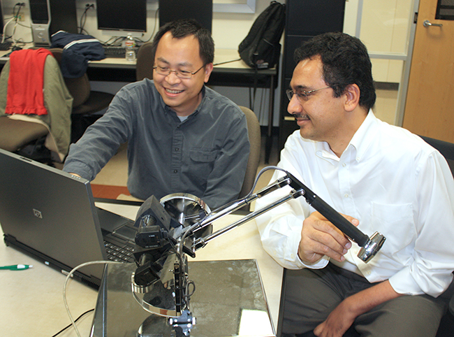 Dr. Xiaohu Guo and Dr. Balakrishnan Prabha Prabhakaran