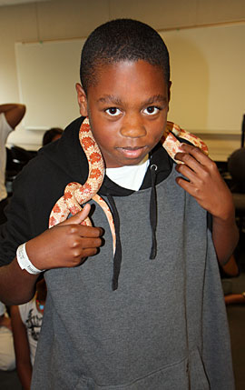 Child with a  snake