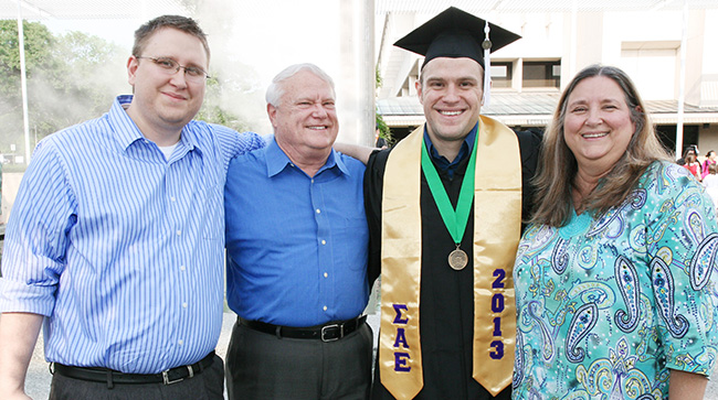 Stephen Knadle with his family after graduation.